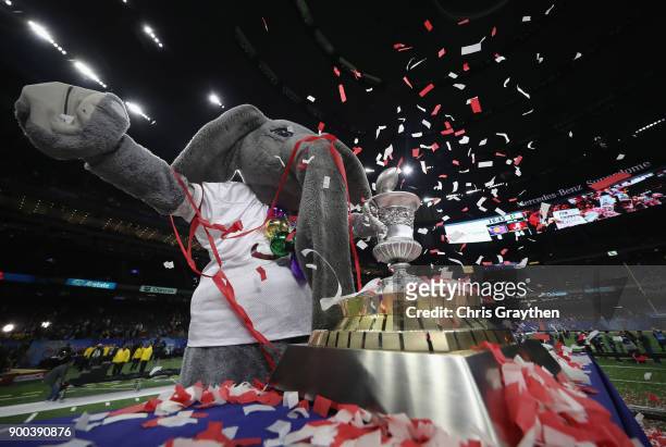 The Alabama Crimson Tide mascot celebrates with the trophy after the AllState Sugar Bowl against the Clemson Tigers at the Mercedes-Benz Superdome on...