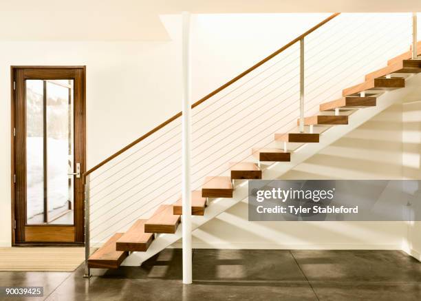 contemporary staircase and door. - steps and staircases stock pictures, royalty-free photos & images