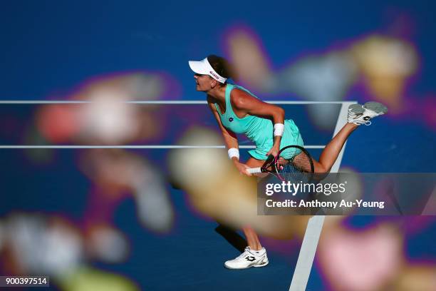 Agnieszka Radwanska of Poland serves in her first round match against Beatriz Haddad Maia of Brazil during day two of the ASB Women's Classic at ASB...