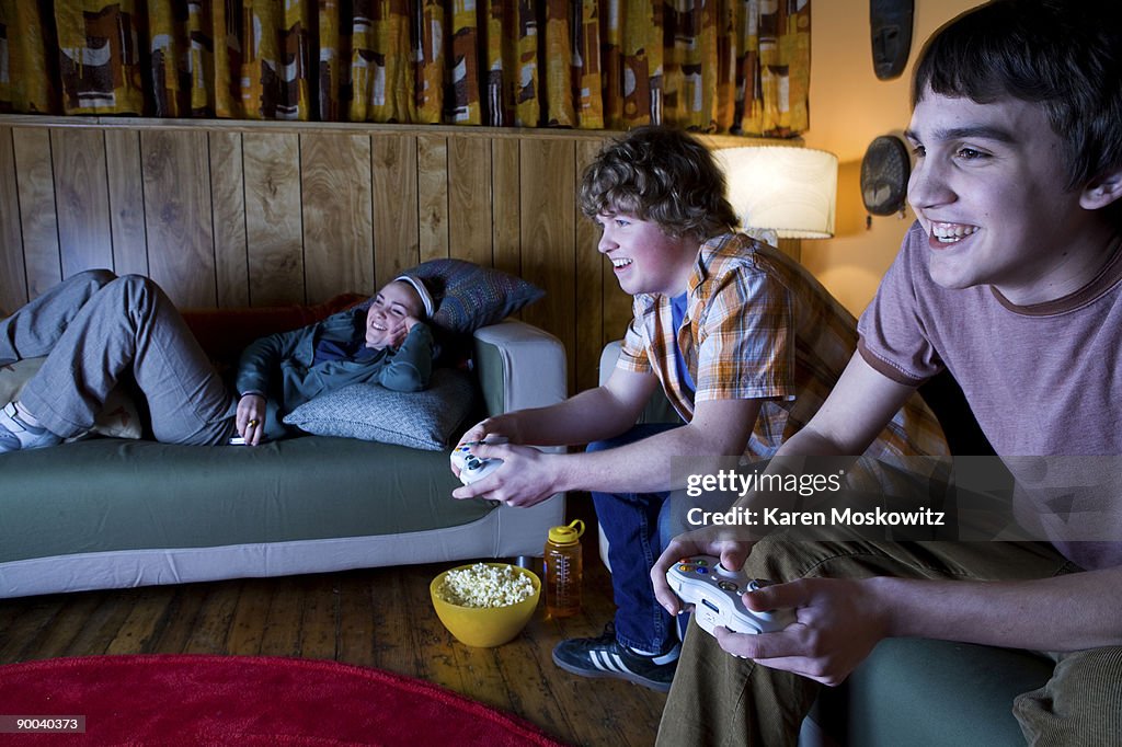 Teens playing video games