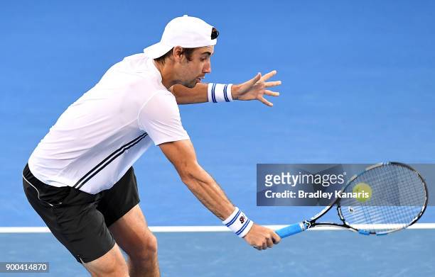Jordan Thompson of Australia plays a backhand in his doubles match with Lleyton Hewitt of Australia against Grigor Dimitrov of Bulgaria and Ryan...