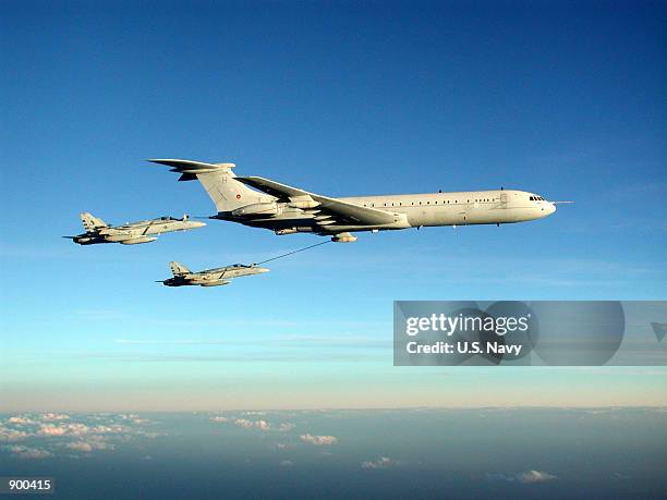 Two F/A-18 "Hornets" receive fuel October 31, 2001 from a British Royal Air Force VC-10 Tanker over Southwest Asia. The aircraft is assigned to the...