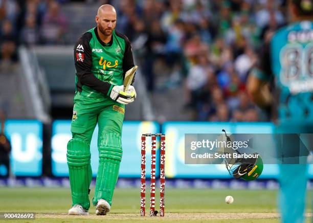 John Hastings of the Stars is hit by a bouncer bowled by Ben Cutting of the Heat and has his helmet knocked off his head during the Big Bash League...