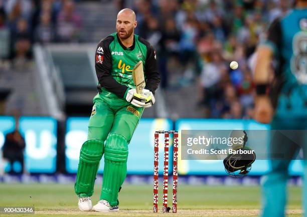John Hastings of the Stars is hit by a bouncer bowled by Ben Cutting of the Heat and has his helmet knocked off his head during the Big Bash League...