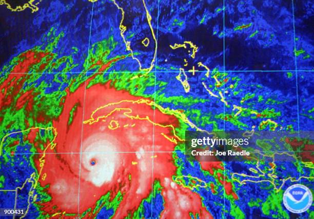 Hurricane Michelle appears on a monitor screen, as it moves in the direction of Cuba, at the United States National Hurricane Center November 3, 2001...