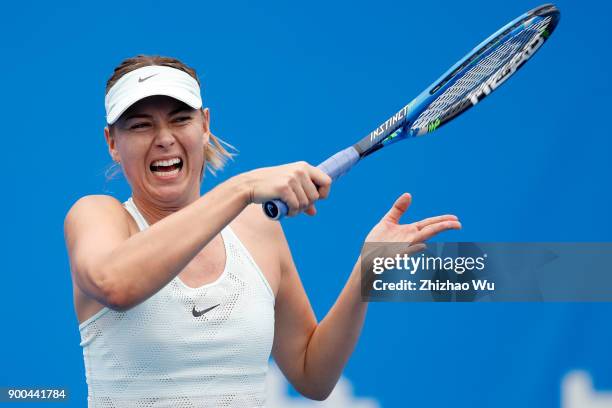 Maria Sharapova of Russia in action during the match against Mihaela Buzarnescu of Romania during Day 2 of 2018 WTA Shenzhen Open at Longgang...