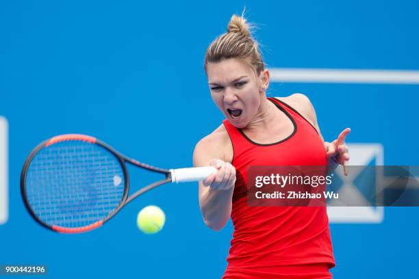 Simona Halep of Romania in action during her match against Nicole Gibbs of the United States during day two of 2018 WTA Shenzhen Open at Longgang...