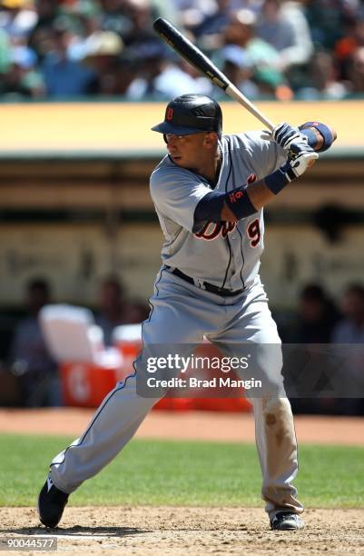 Carlos Guillen of the Detroit Tigers bats against the Oakland Athletics during the game at the Oakland-Alameda County Coliseum on August 23, 2009 in...