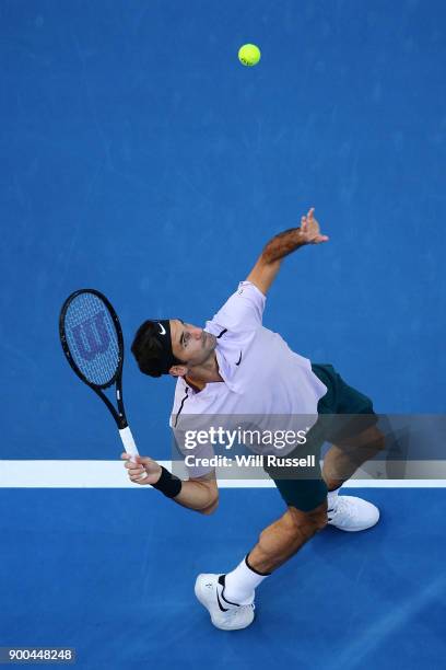 Roger Federer of Switzerland serves to Karen Khachanov of Russia in the mens singles match on day four of the 2018 Hopman Cup match at Perth Arena on...