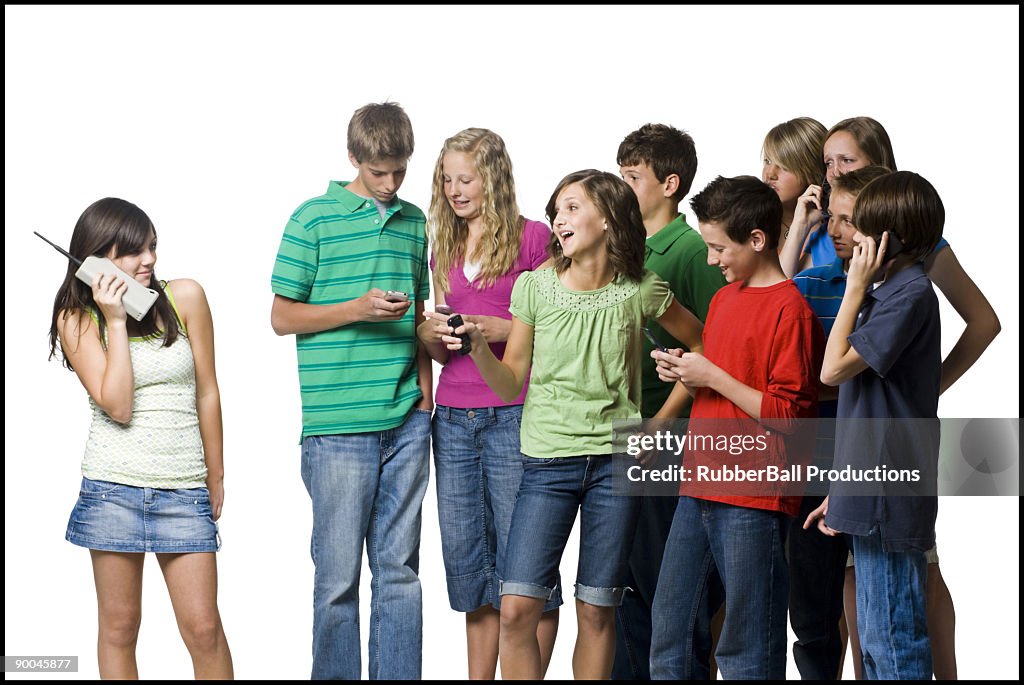 Teenagers using cell phones
