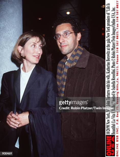 New York, NY. John Turturro with his wife, Katherine Borowitz at the gala New York premiere of "Life Is Beautiful ," hosted by Isabella Rossellini.