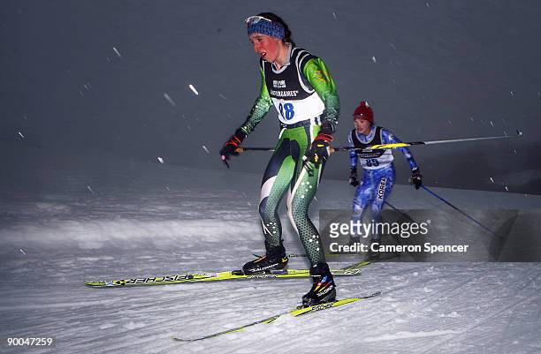 Aimee Watson of Australia and Seul-Gi Nam of Korea competes in the FIS women's 5km Cross Country Skiing during day four of the Winter Games NZ at the...