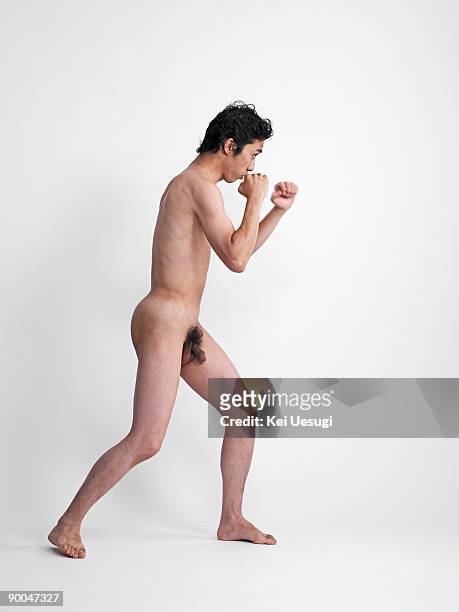 a portrait of naked man. - pene foto e immagini stock