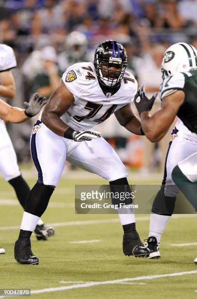 Michael Oher of the Baltimore Ravens blocks during a preseason game against the New York Jets at M&T Bank Stadium on August 24, 2009 in Baltimore,...