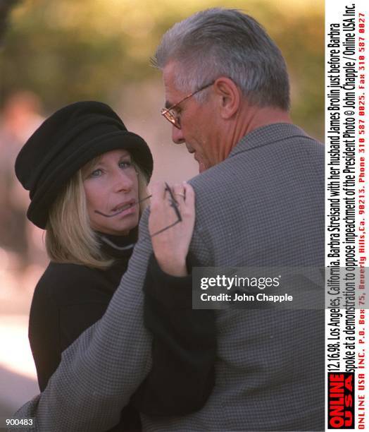 Los Angeles, California. Barbra Streisand with husband James Brolin just before Barbra spoke at a demonstration to oppose the impeachment of the...