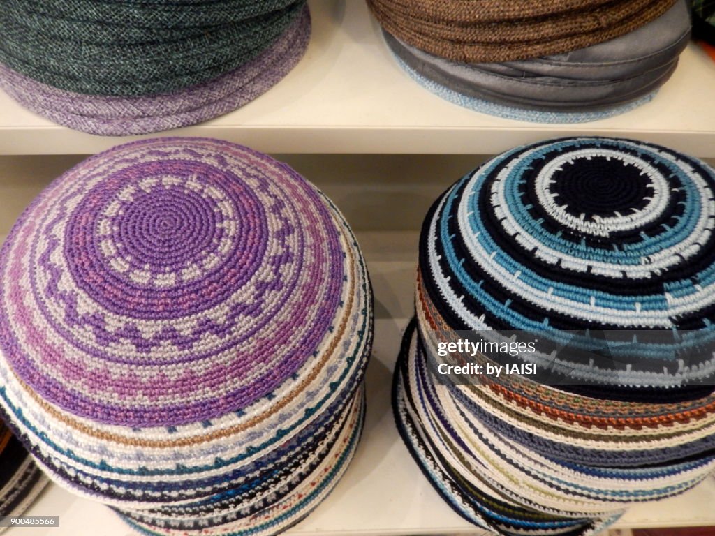 Lots of kipas / yarmulkes at the market