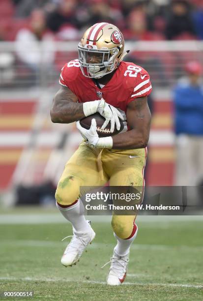 Carlos Hyde of the San Francisco 49ers carries the ball against the Jacksonville Jaguars during their NFL football game at Levi's Stadium on December...