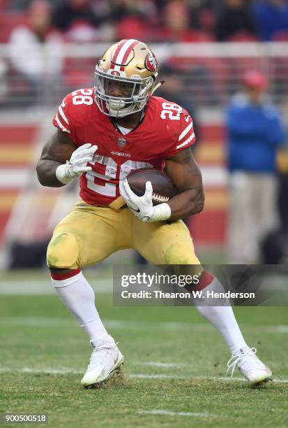 Carlos Hyde of the San Francisco 49ers carries the ball against the Jacksonville Jaguars during their NFL football game at Levi's Stadium on December...