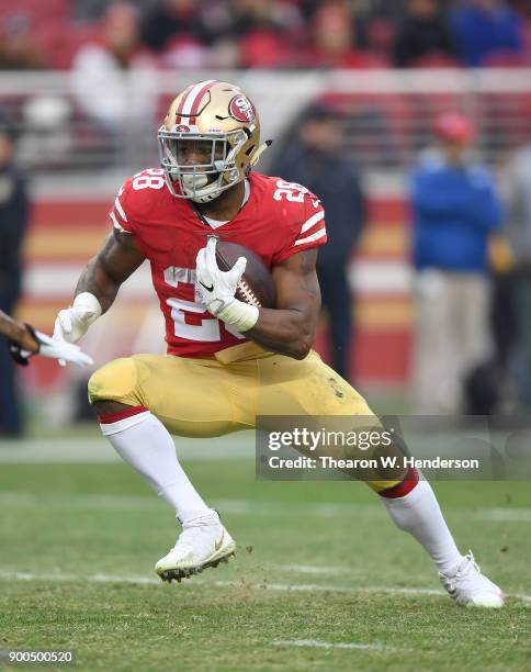 Carlos Hyde of the San Francisco 49ers carries the ball against the Jacksonville Jaguars during their NFL football game at Levi's Stadium on December...