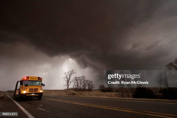 schoolbus in peril - chasing bus stock pictures, royalty-free photos & images