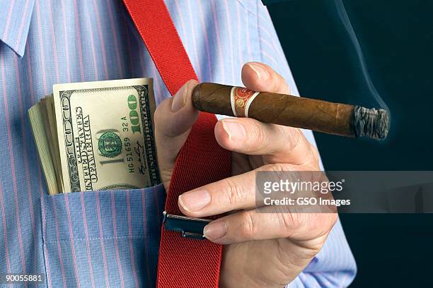pocket full of dollars - cigar ストックフォトと画像