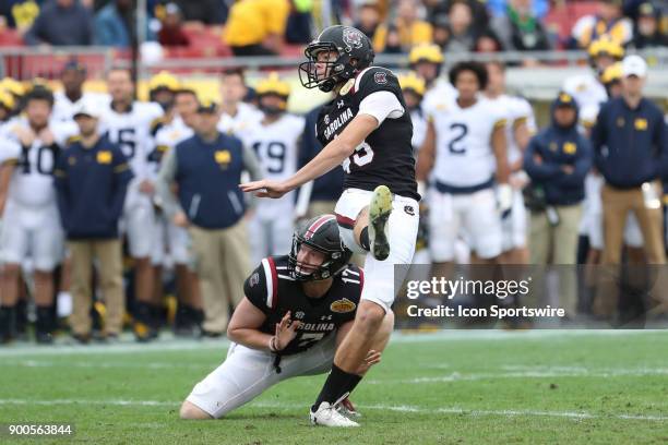 South Carolina Gamecocks place kicker Parker White kicks a field goal during the 2018 Outback Bowl between the Michigan Wolverines and South Carolina...