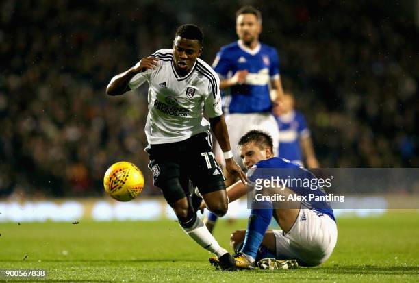 Floyd Ayite of Fulham goes past Jonas Knudsen of Ipswich during the Sky Bet Championship match between Fulham and Ipswich Town at Craven Cottage on...