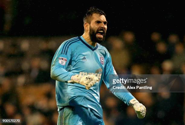 Bartosz Bialkowski of Ipswich celebrates after his side score their first during the Sky Bet Championship match between Fulham and Ipswich Town at...