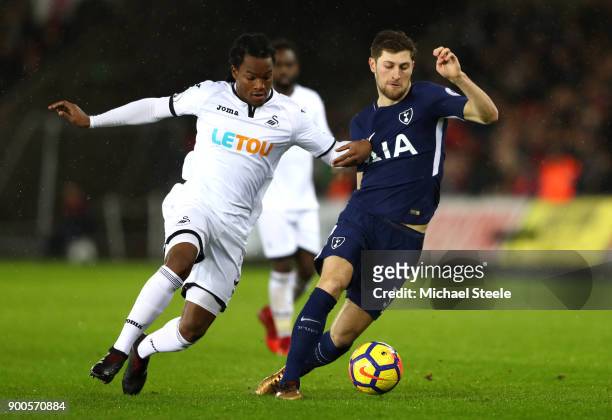 Ben Davies of Tottenham Hotspur is challenged by Renato Sanches of Swansea City during the Premier League match between Swansea City and Tottenham...
