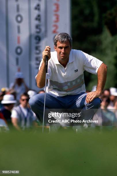 Curtis Strange golfing.