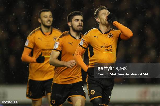 Barry Douglas of Wolverhampton Wanderers celebrates after scoring a goal to make it 2-0 during the Sky Bet Championship match between Wolverhampton...