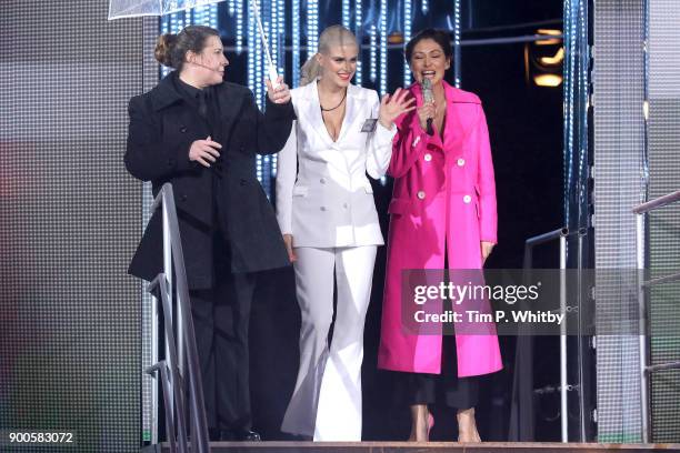 Ashley James with host Emma Willis as she enters the "Celebrity Big Brother" House at Elstree Studios on January 2, 2018 in Borehamwood, England.