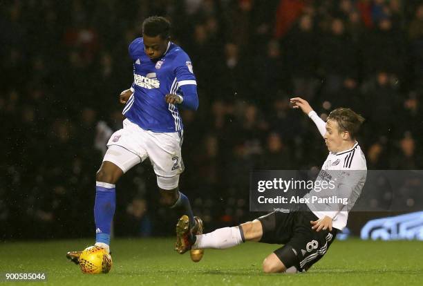 Stefan Johansen of Fulham tackles Dominic Iorfa of Ipswich during the Sky Bet Championship match between Fulham and Ipswich Town at Craven Cottage on...