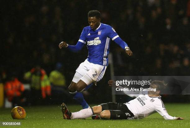 Stefan Johansen of Fulham tackles Dominic Iorfa of Ipswich during the Sky Bet Championship match between Fulham and Ipswich Town at Craven Cottage on...