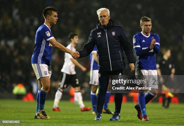 Jonas Knudsen shakes hands with his manager Mick McCarthy during the Sky Bet Championship match between Fulham and Ipswich Town at Craven Cottage on...