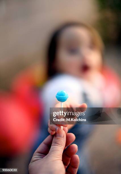 bribery lolipop - lecca lecca foto e immagini stock