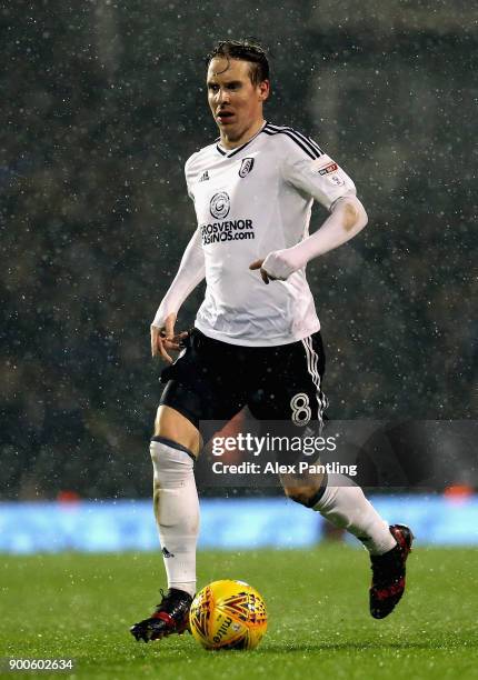 Stefan Johansen of Fulham runs with the ball during the Sky Bet Championship match between Fulham and Ipswich Town at Craven Cottage on January 2,...