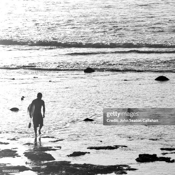 surfer on nias island in north sumatra - nias island bildbanksfoton och bilder