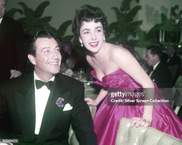 Actors Elizabeth Taylor and Robert Taylor at the premiere after-party for 'Quo Vadis' in Los Angeles, California, 29th November 1951. Robert Taylor...