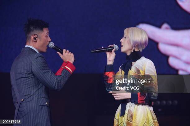 Actor and singer Shawn Yue and actress and singer Miriam Yeung perform during Miriam Yeung 321Go! tour concert 2017 at Hong Kong Coliseum on January...