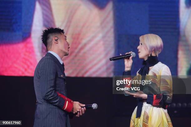 Actor and singer Shawn Yue and actress and singer Miriam Yeung perform during Miriam Yeung 321Go! tour concert 2017 at Hong Kong Coliseum on January...