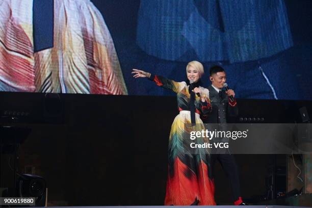 Actor and singer Shawn Yue and actress and singer Miriam Yeung perform during Miriam Yeung 321Go! tour concert 2017 at Hong Kong Coliseum on January...