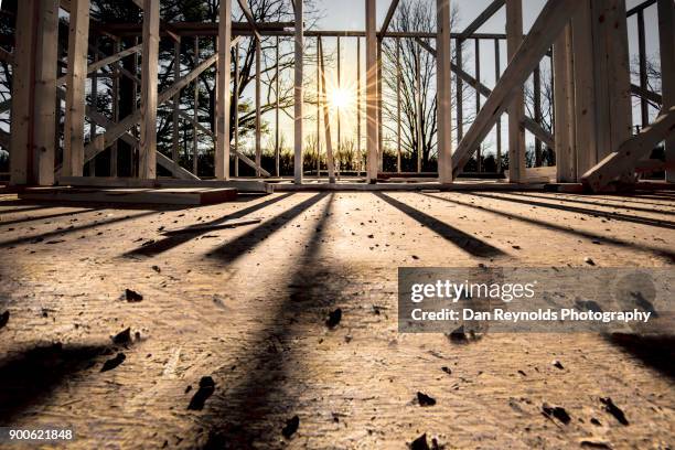 residential house construction at sunset - timber window frames stock pictures, royalty-free photos & images