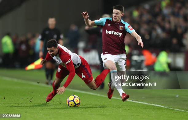 Hal Robson-Kanu of West Bromwich Albion and Declan Rice of West Ham United during the Premier League match between West Ham United and West Bromwich...