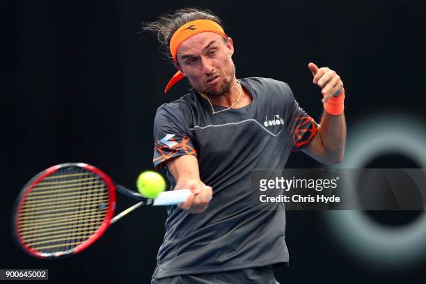 Alexandr Dolgopolov of Ukraine plays a forehand in his match against Horacio Zeballos of Argentina during day four of the 2018 Brisbane International...