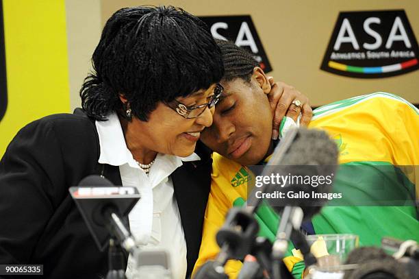 Winnie Mandela and Caster Semenya talk to press during the Team SA Press Conference at the Holiday Inn on August 25, 2009 in Johannesburg, South...
