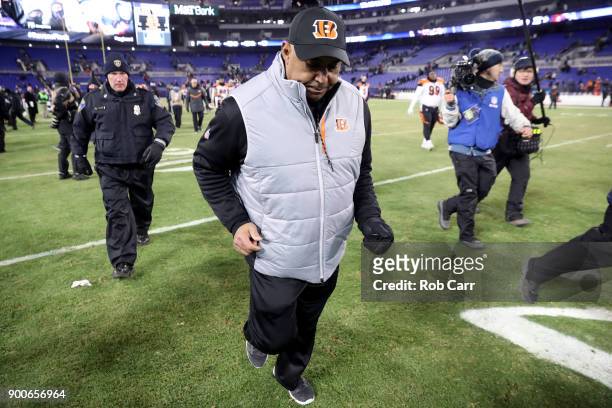 Head coach Marvin Lewis of the Cincinnati Bengals walks off the field following the Bengals win over the Baltimore Ravens at M&T Bank Stadium on...