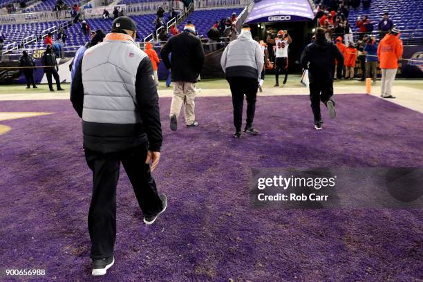 Head coach Marvin Lewis of the Cincinnati Bengals walks off the field following the Bengals win over the Baltimore Ravens at M&T Bank Stadium on...