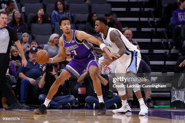 Skal Labissiere of the Sacramento Kings is guarded by Jarell Martin of the Memphis Grizzlies at Golden 1 Center on December 31, 2017 in Sacramento,...