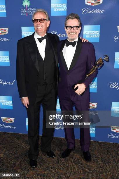 Peter Fonda and Desert Palm Achievement Award winner, Gary Oldman attend the 29th Annual Palm Springs International Film Festival Awards Gala at Palm...